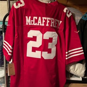 NFL Red Jersey with Silver Logo